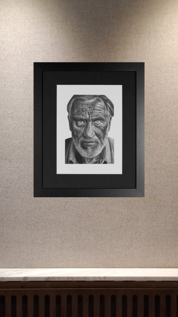 Realistic charcoal portrait drawing of elderly man by artist Janis Baer