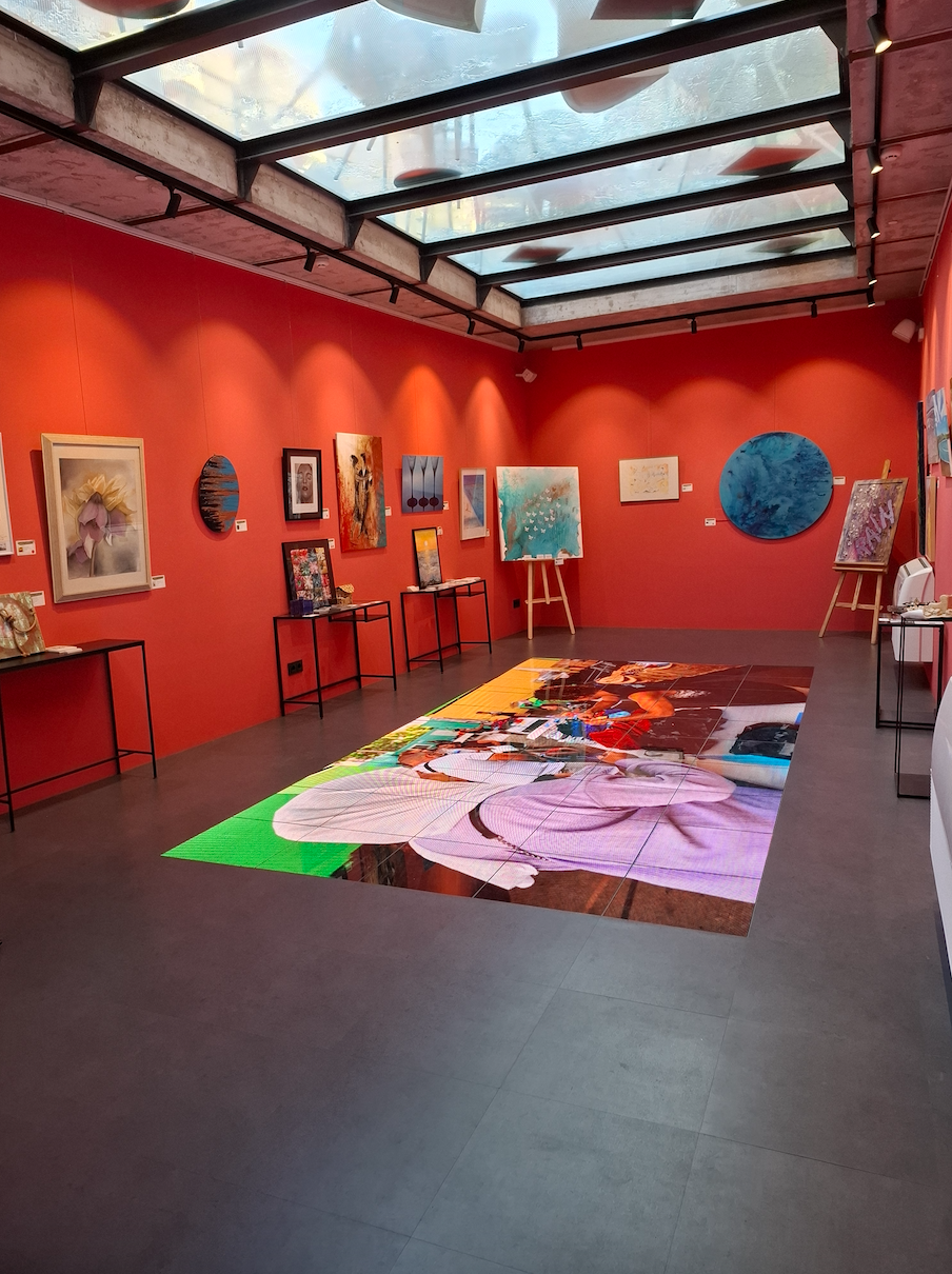 Charity art event "Art for a good reason" at Hotel Artmadams in Mallorca, view of artworks displayed in the exhibition space. Charcoal and graphite art exhibitions.