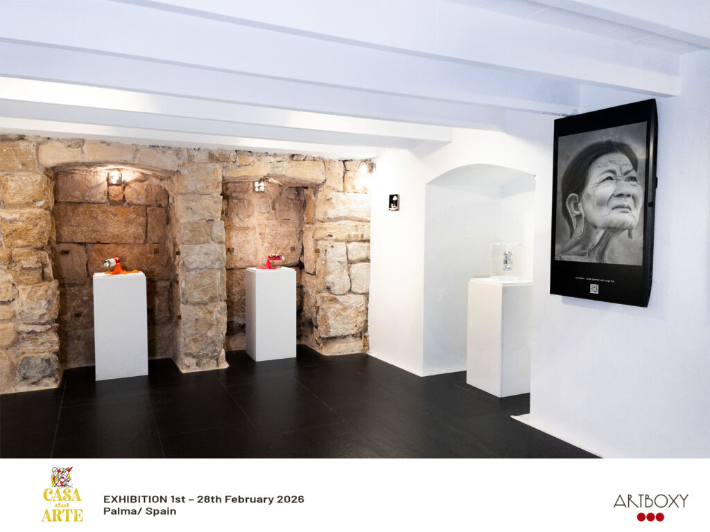 Charcoal portrait drawing "Echoes of Life" by Janis Bär presented in an international digital exhibition at Casa del Arte, Palma de Mallorca, Spain, February 2026.