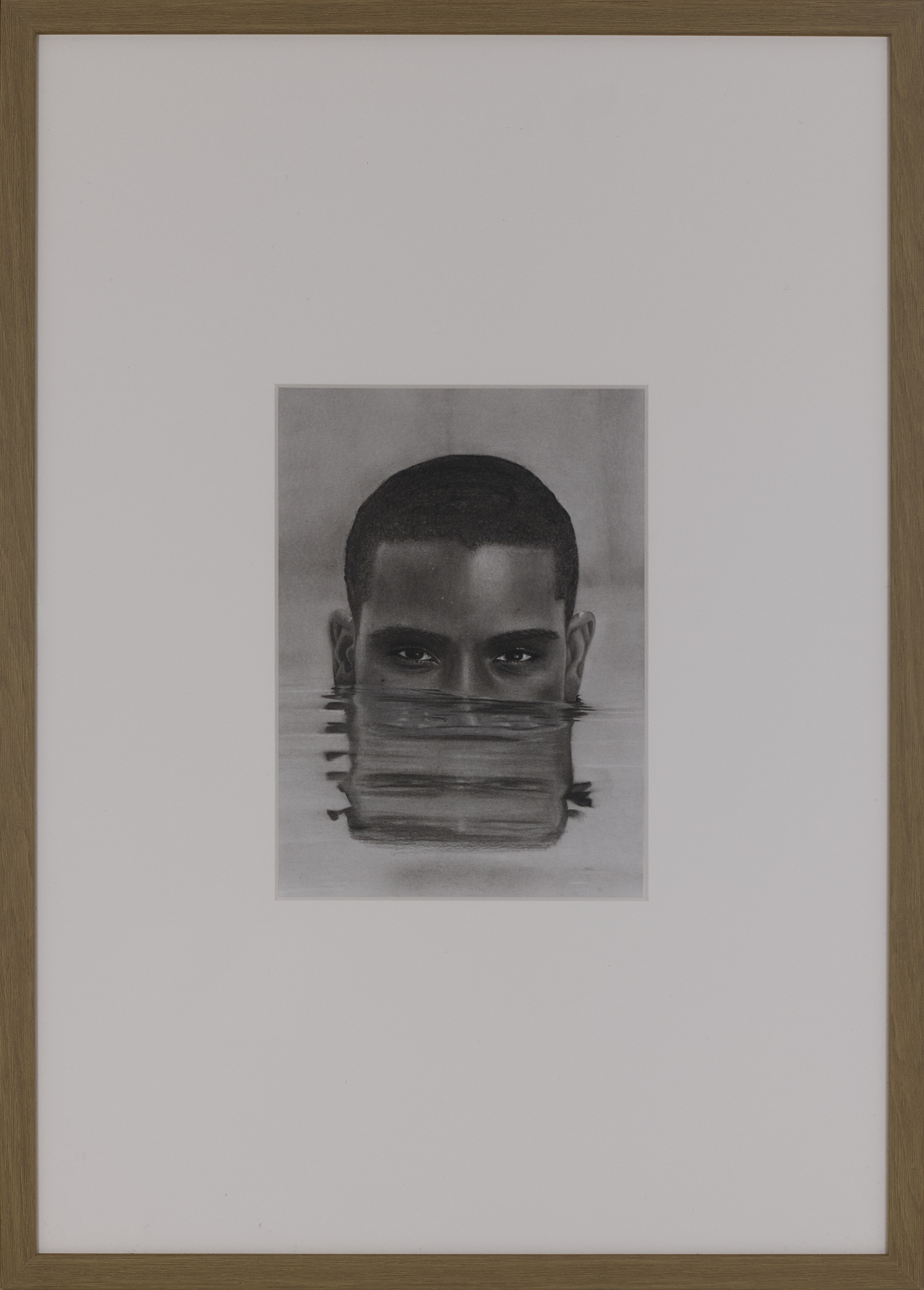 Framed presentation of Between Selves (2024), a contemporary charcoal portrait by Janis Bär with passepartout and oak frame.