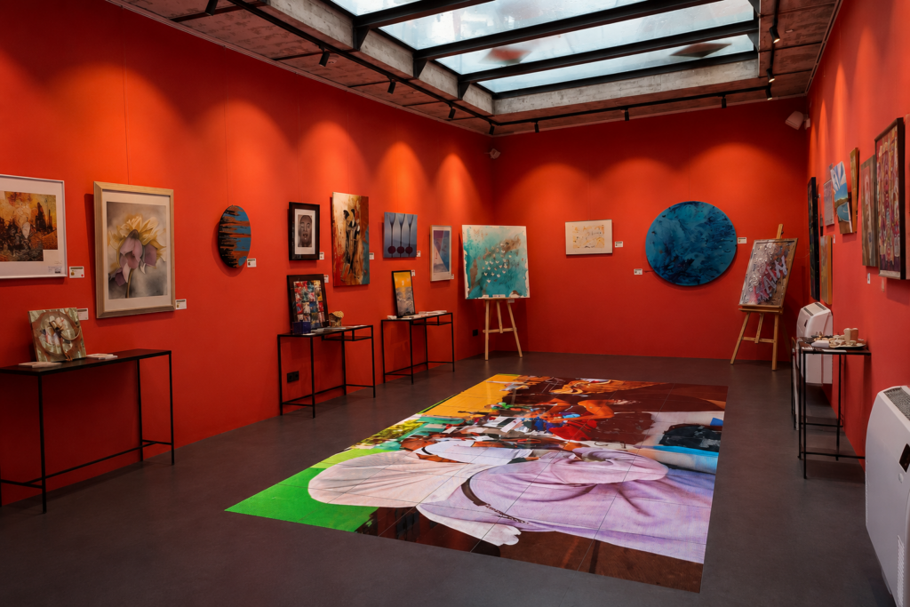 Contemporary gallery interior showcasing artworks in an international exhibition space