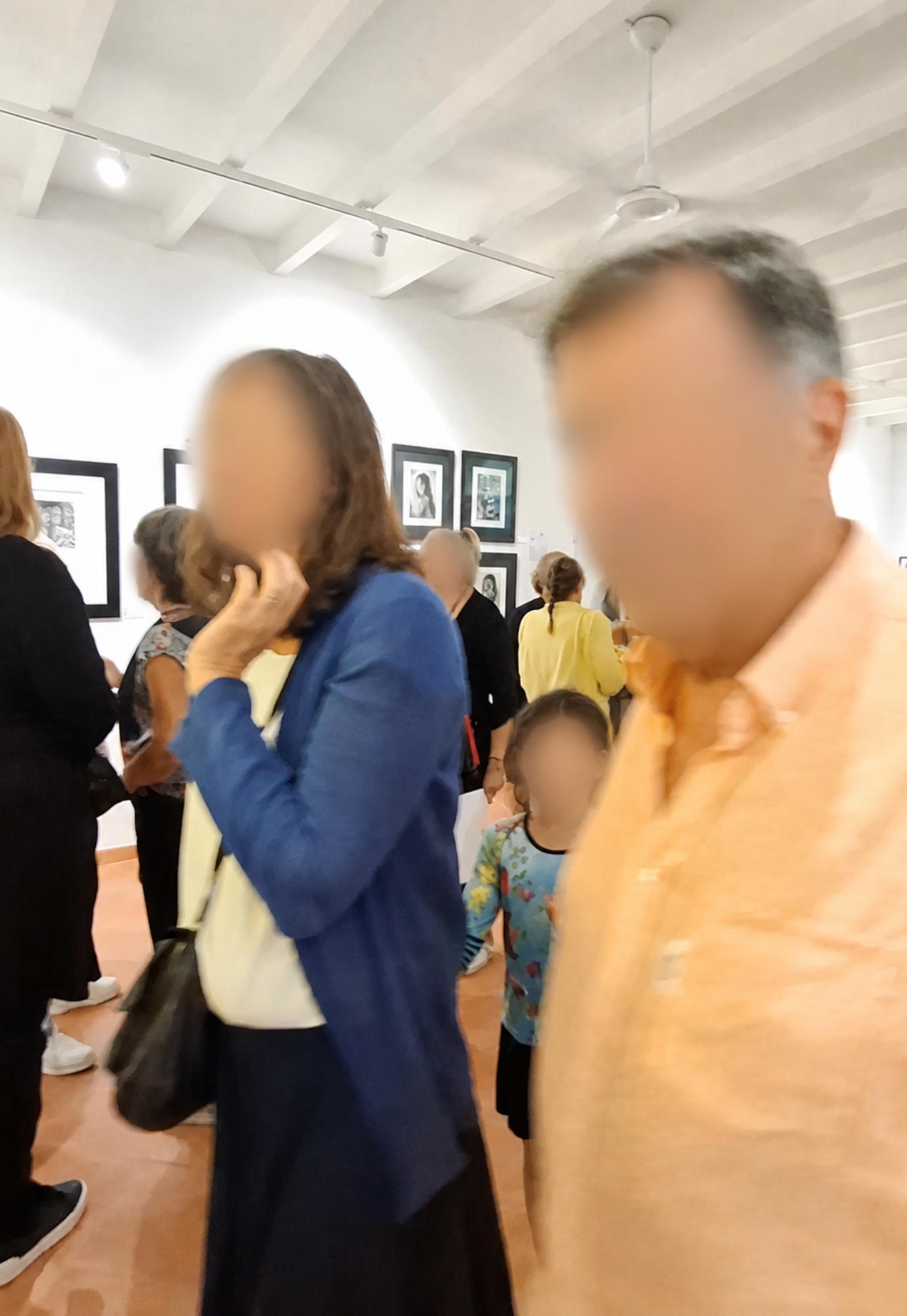 Visitors viewing artworks during the Artists of Mallorca Autumn Exhibition 2025 at Museu de Sóller, Mallorca.