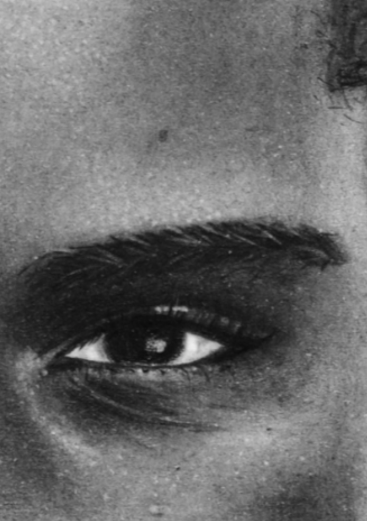 Close-up eye detail from Between Selves, a contemporary charcoal portrait artwork by Janis Bär.
