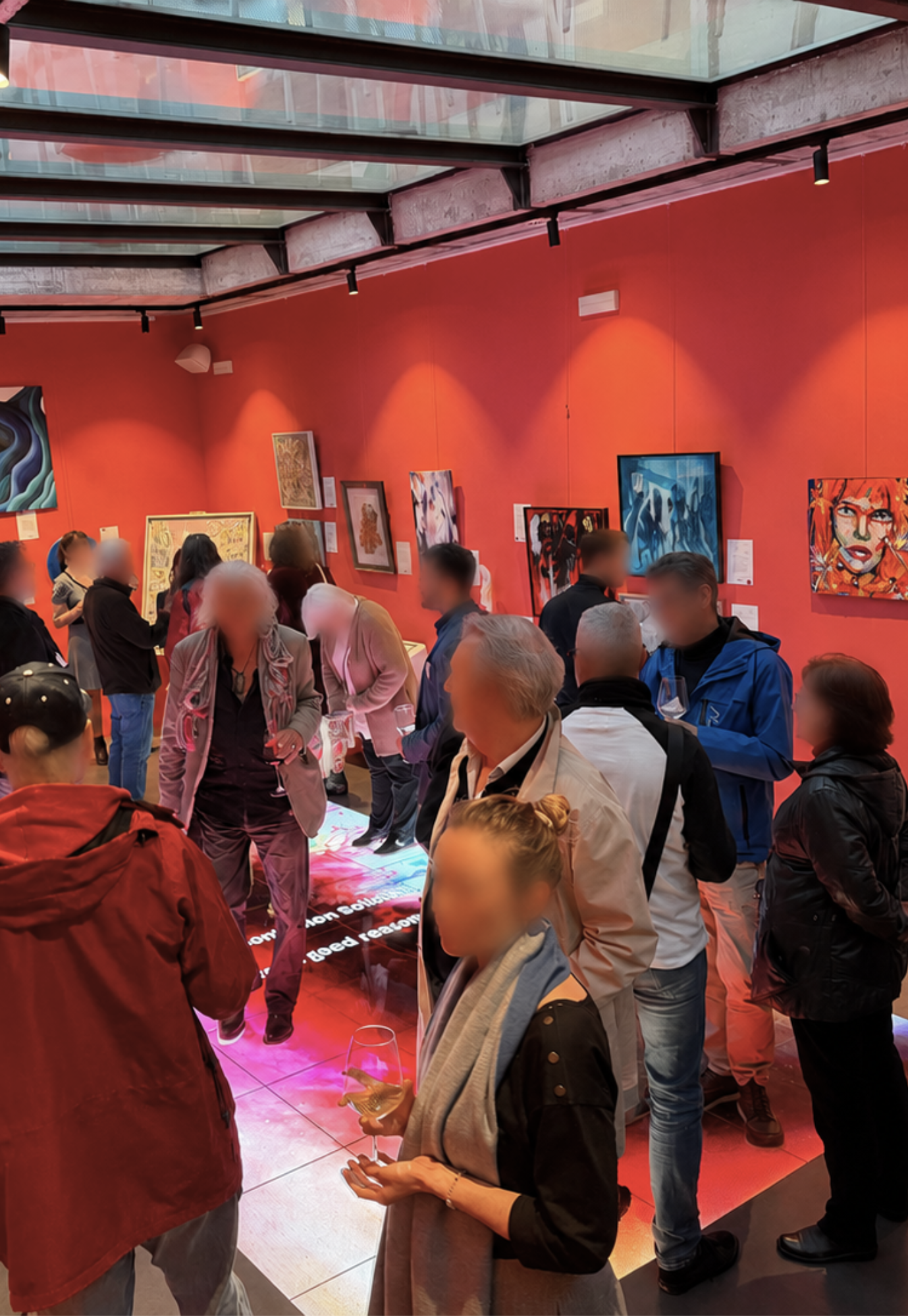 Visitors viewing artworks during the ART for a Good Reason charity exhibition at Skylight Gallery, Hotel Artmadams, Palma de Mallorca, 2026.